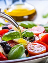 What works best to keep cardiovascular risk factors low, a high fat diet, a Mediterranean diet or a high carbohydrate low fat diet?