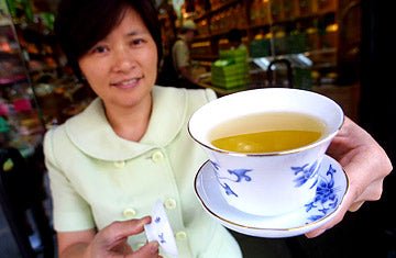 If you want to drink something uplifting, green tea may be it.